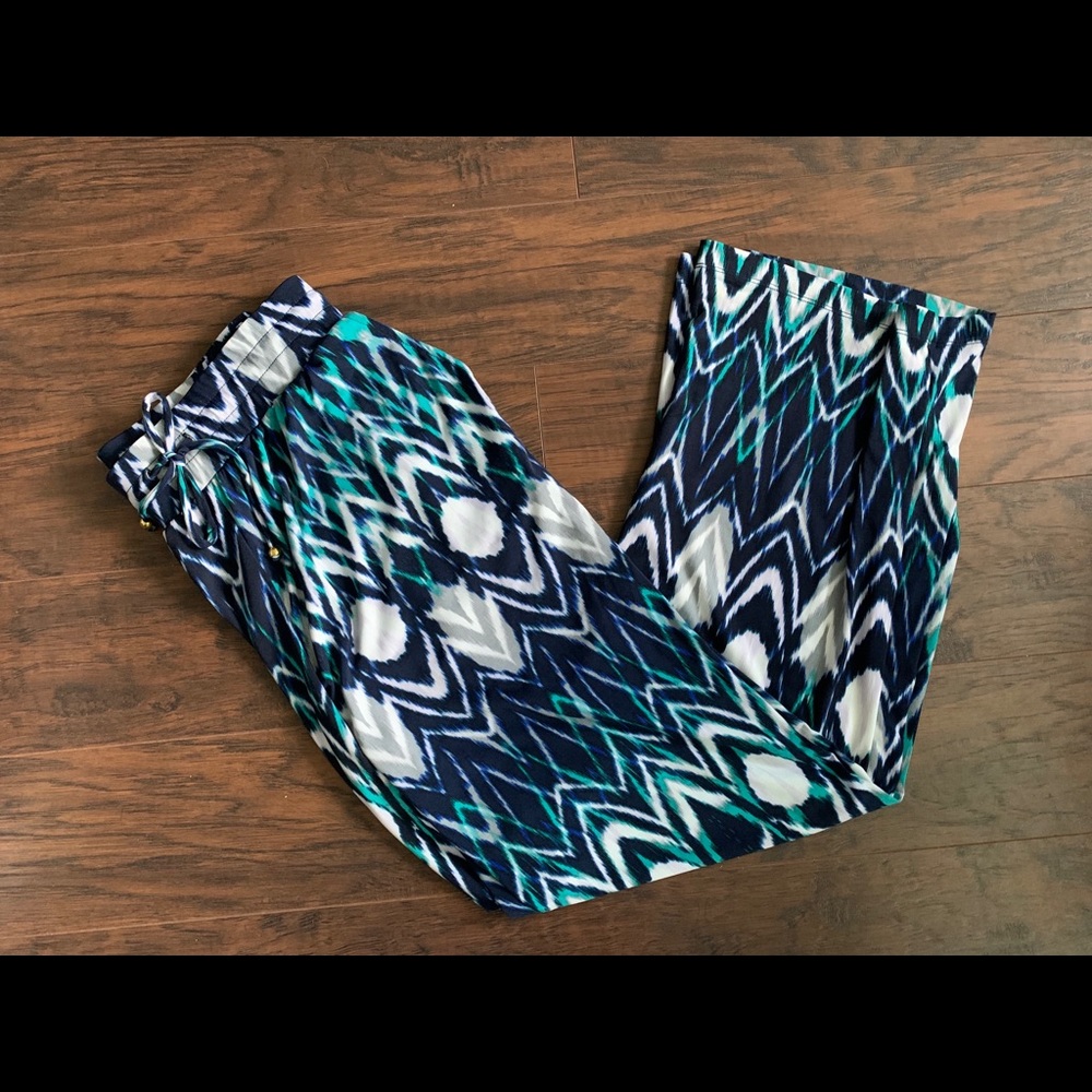 Flowy straight leg pants. Not marked but are Large